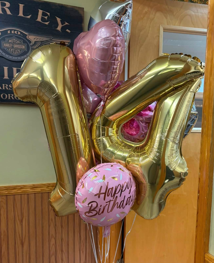 Colorful heart and flower balloon arrangement